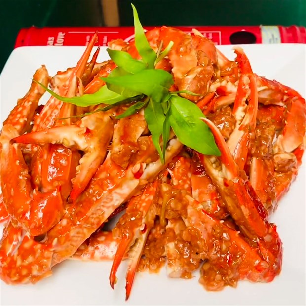 Ghẹ rang nước mắm: cách làm giòn ngon chuẩn nhà hàng 8 Ghẹ rang nước mắm vàng óng hấp dẫn chuẩn nhà hàng với lớp sốt bám đều